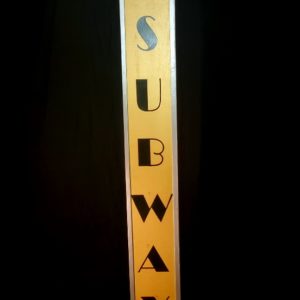 Golden Subway Sign